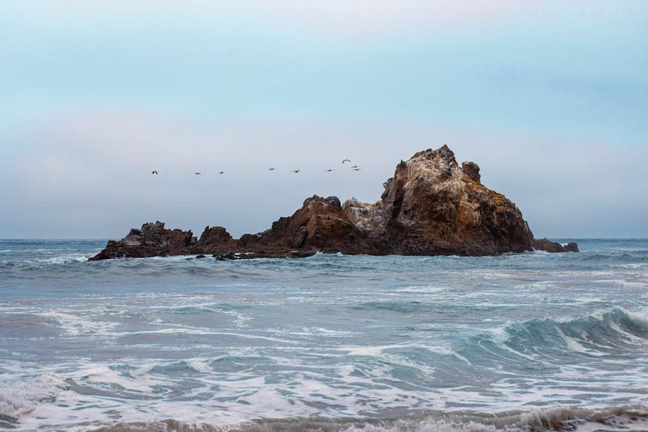 Sunset over Central Coast rocky shoreline