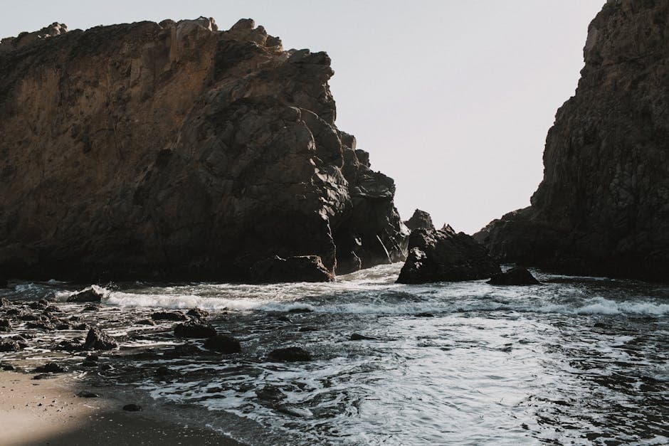 Dramatic Big Sur coastline with cliffs plunging into the Pacific Ocean along Highway 1